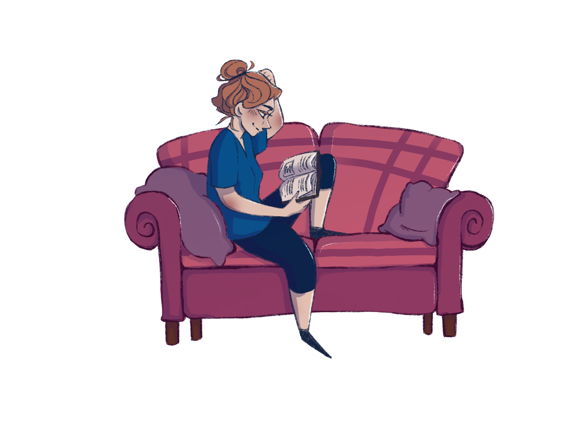 Frau sitzt aus Sofa und liest ein Buch